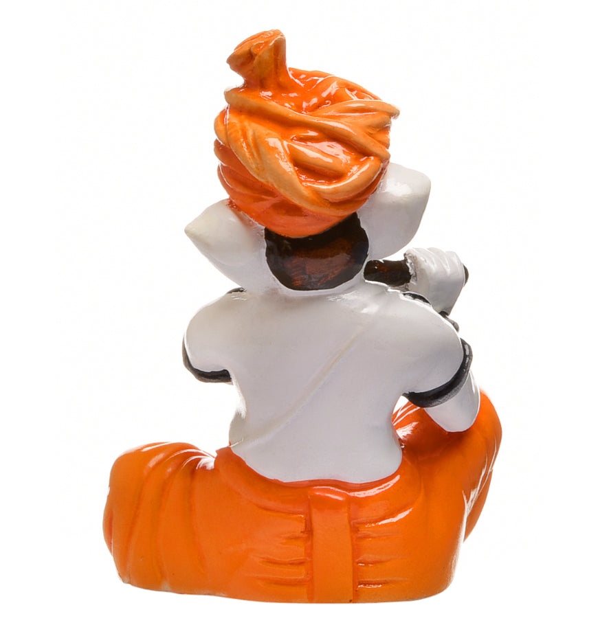 Graceful Lord Ganeshas Serenade One Of A Kind Resin Seated Flute Figure For Home Pooja Gifting Premium Home Decor 4 Lord Ganesha's Serenade: Unique Resin Seated Flute Idol for Home, Pooja & Gifting - Karigaari India Aesthetic Home Decor