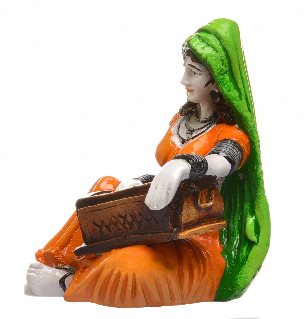 Graceful Musical Heritage Figure Artisan Painted Resin Rajasthani Lady Playing Instrument Artful Decor Piece 4 Musical Heritage Figurine: Hand-Painted Resin Rajasthani Lady Playing Instrument - Karigaari India Aesthetic Home Decor
