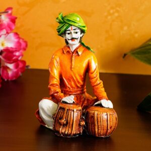 The Heartbeat of Rajasthan: Unique Seated Man Figurine Playing Tabla - Karigaari India Aesthetic Home Decor