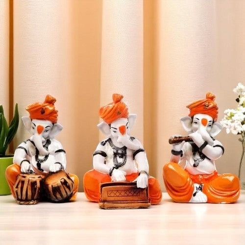 Three Little Lord Ganesha Playing Instruments Idol Orange Color Best & Unique for Home Decor - Karigaari India Aesthetic Home Decor