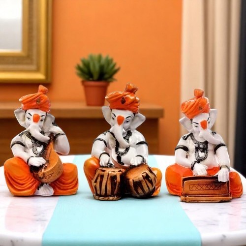 Unique Design Three Little Lord Ganesha Playing Instruments Idol Orange Color Best for Home Decor - Karigaari India Aesthetic Home Decor