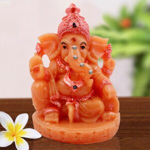 Unique Lord Ganesha Sitting With One Leg Down Idol Orange Color And Pink Ornaments Best for Home Decor - Karigaari India Aesthetic Home Decor