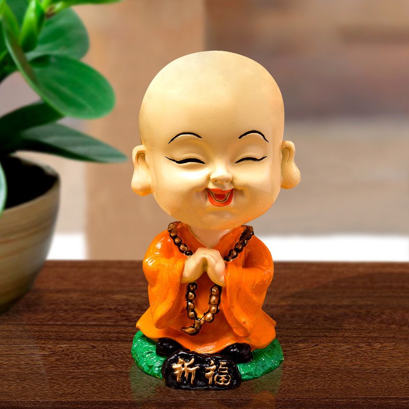 Luxurious Handmade Ployresin Lord Buddha Praying Figurine Display Piece Home Decor Office Home Decor Spiritual Gift Orange Colour Unique Decor Piece 1 Handcrafted Ployresin Lord Buddha Praying Statue Showpiece Home Decor/Office Decor/Spiritual Gift, Orange Colour - Karigaari India Aesthetic Home Decor