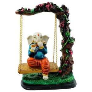 Lord Ganesha Sitting on Jhula Playing Flute Idol for Home Decor - Karigaari India Aesthetic Home Decor
