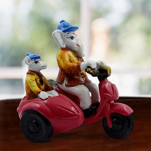 Stylish Distinctive Design Lord Ganesha Riding Scooter Statue Multicolour Best For Home Decor Unique Decor Piece 1 Unique Design Lord Ganesha Riding Scooter Idol Multicolor Best for Home Decor - Karigaari India Aesthetic Home Decor