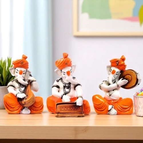 Stylish Distinctive Design Three Lord Ganesha Playing Instruments Figurine Orange Best Item For Home Home Decor Artful Decor Piece 1 Unique Design Three Lord Ganesha Playing Instruments Idol Orange Best Item for Home Decor - Karigaari India Aesthetic Home Decor