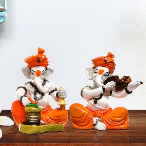 Stylish Distinctive Little Two Lord Ganesha Playing Instruments Figurine Orange Best For Home Decoration 2 Unique Little Two Lord Ganesha Playing Instruments Idol Orange Best for Home Decor - Karigaari India Aesthetic Home Decor