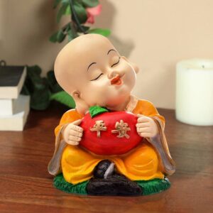 Handcrafted Ployresin Lord Buddha Orange Colour Sitting With Taking Apple In Hand Statue  Showpiece Home Decor/Office Decor/Spiritual Gift - Karigaari India Aesthetic Home Decor