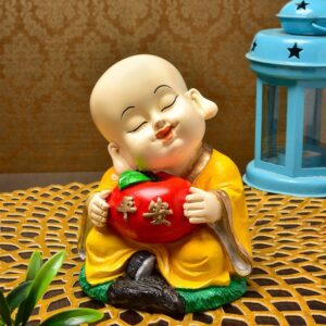 Handcrafted Ployresin Lord Buddha Orange Colour Sitting With Taking Apple In Hand Statue  Showpiece Home Decor/Office Decor/Spiritual Gift - Karigaari India Aesthetic Home Decor