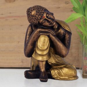 Handcrafted Ployresin Sitting With Putting Hand And Head on Knee Lord Buddha Statue Showpiece Home Decor/Office Decor/Spiritual Gift, Golden Colour - Karigaari India Aesthetic Home Decor