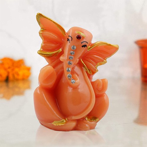 Small Unique Lord Ganesha Sitting Idol Orange Color And Pink Ornaments Best for Home Decor - Karigaari India Aesthetic Home Decor