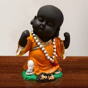 Handcrafted Ployresin Standing Lord Buddha Statue Showpiece Home Decor/Office Decor/Spiritual Gift, Black And Orange - Karigaari India Aesthetic Home Decor