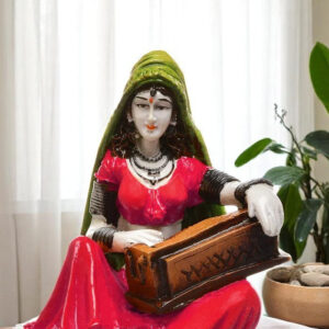 The Serenade of Rajasthan: Hand-Painted Resin Woman and Her Harmonium - Karigaari India Aesthetic Home Decor