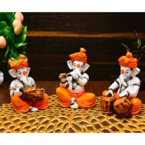 Three Little Lord Ganesha Playing Instruments Idol Orange Color Best for Home Decor - Karigaari India Aesthetic Home Decor
