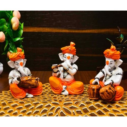 Three Little Lord Ganesha Playing Instruments Idol Orange Color Best for Home Decor - Karigaari India Aesthetic Home Decor