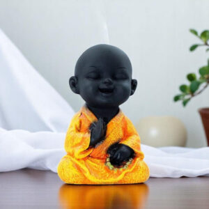 Handcrafted Ployresin Lord Buddha Sitting And Praying Statue Showpiece Home Decor/Office Decor/Spiritual Gift, Black And Orange - Karigaari India Aesthetic Home Decor