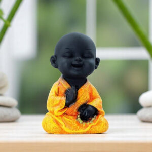 Handcrafted Ployresin Lord Buddha Sitting And Praying Statue Showpiece Home Decor/Office Decor/Spiritual Gift, Black And Orange - Karigaari India Aesthetic Home Decor