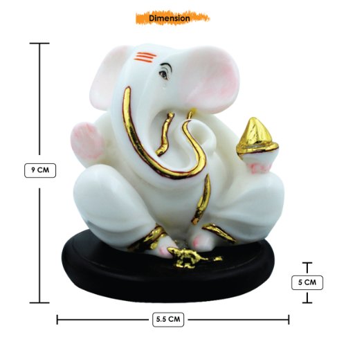 Small Lord Ganesha Sitting With Holding Golden Modak in Hand White Color Idol for Home Decor - Karigaari India Aesthetic Home Decor