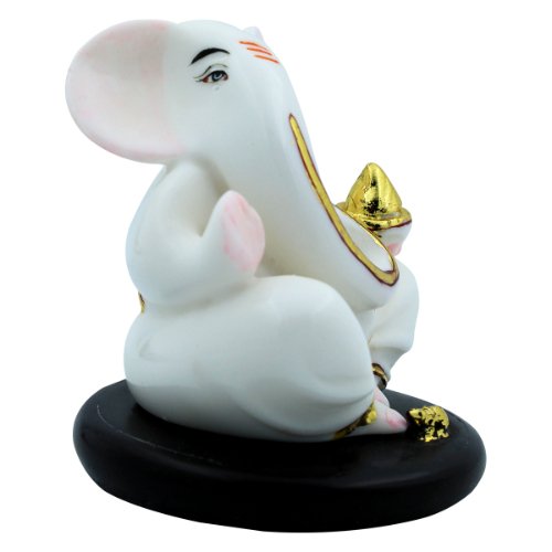 Small Lord Ganesha Sitting With Holding Golden Modak in Hand White Color Idol for Home Decor - Karigaari India Aesthetic Home Decor