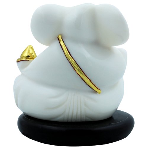 Small Lord Ganesha Sitting With Holding Golden Modak in Hand White Color Idol for Home Decor - Karigaari India Aesthetic Home Decor