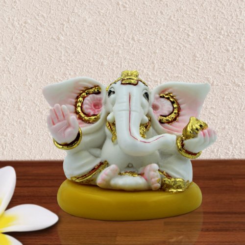 Small Lord Ganesha Idol Holding Golden Modak White Color Best for Home Decor - Karigaari India Aesthetic Home Decor